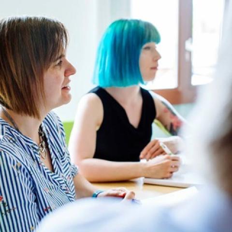 Two women sitting at a table
