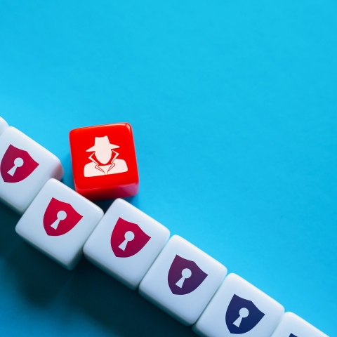 An image of Portsmouth Harbour with a ferry in the foreground and the Spinnaker Tower in the background
