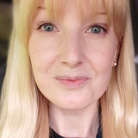 Deborah Lawson smiling to camera in close up