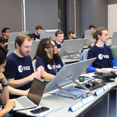 Students at computers in the University's space mission design facility