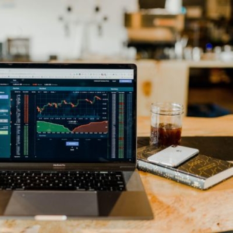 financial markets on a laptop