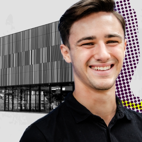 A male student smiling and a female student with a laptop