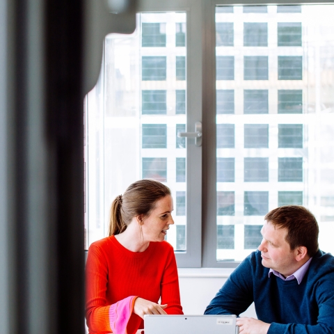 Staff members in a meeting