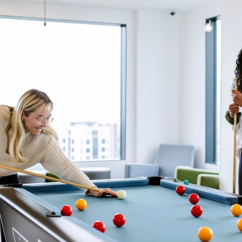 Students playing pool