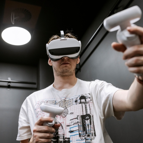 Student wearing a VR headset as the CCIXR centre