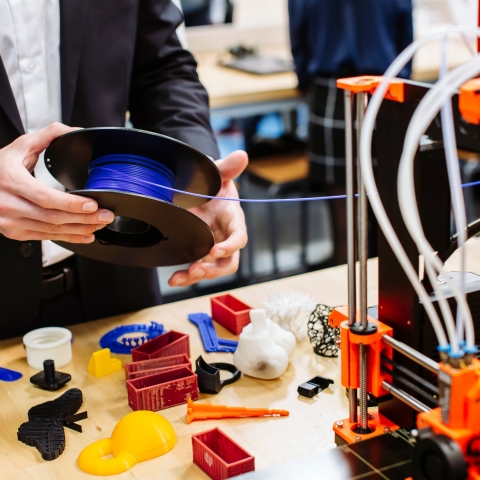 Student using a 3D printer at Engineering Project Day