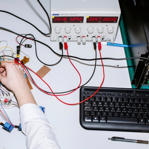Male student in the telecommunications lab
