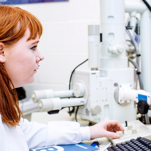 Female student  on computer in biology lab