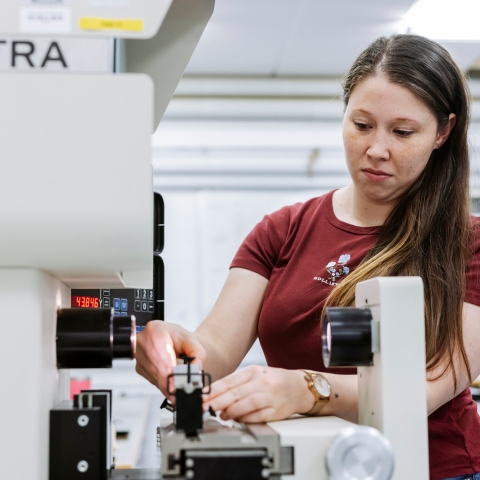 Female student operating cutting bench.
Technology Facilities Day One - NOT FOR THIRD PARTY - CONSENT