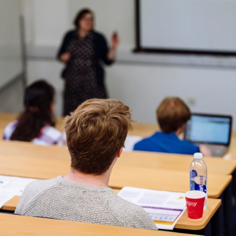 Male student in a lecture theatre