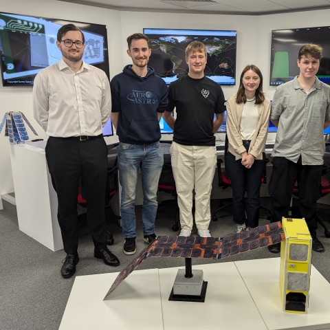 Students involved in the Jupiter project standing side by side for a photo