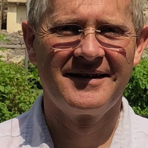 Picture of Peter Neyroud smiling to camera