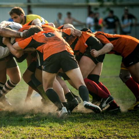 Men playing rugby - Photo by Olga Guryanova on Unsplash