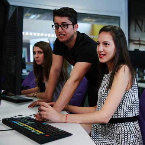 University of Portsmouth students working at computer