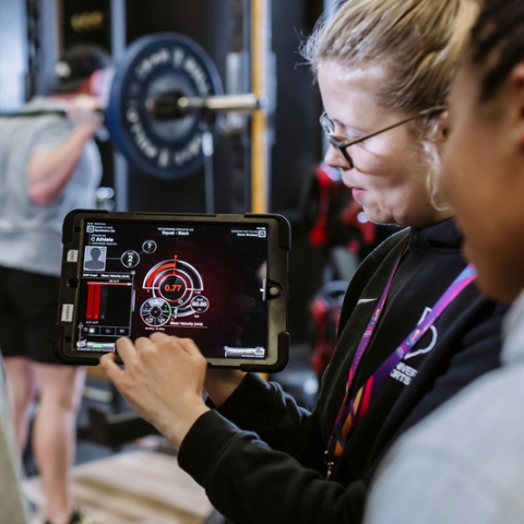 Athlete checking for range of motion at squat rack
