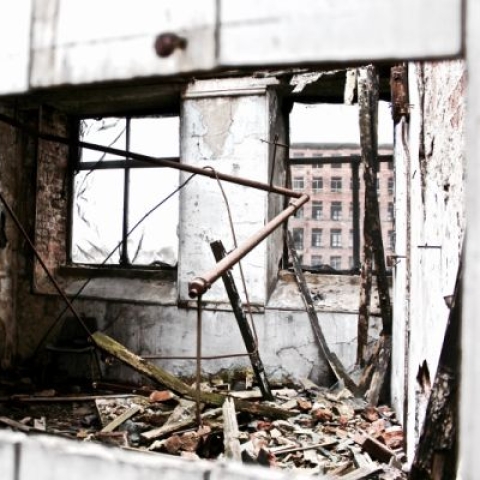 A room in an abandoned building which has been destroyed