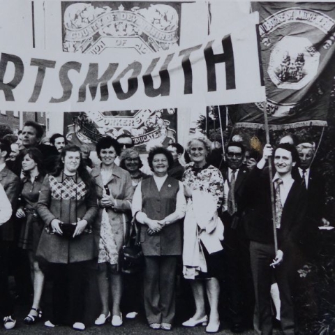 A black and white photo showing a group of women activists in Portsmouth