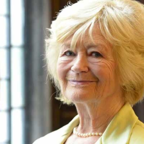 Yvonne Moores headshot smiling to camera