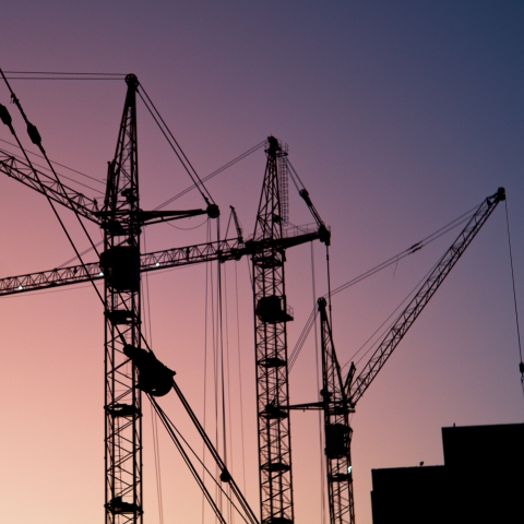 Picture of three tower cranes