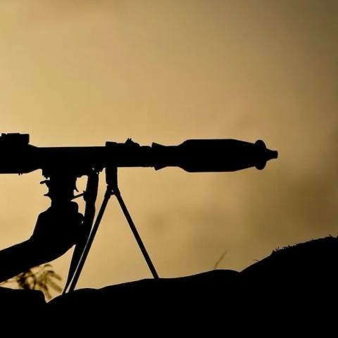 Silhouette of soldier with rifle