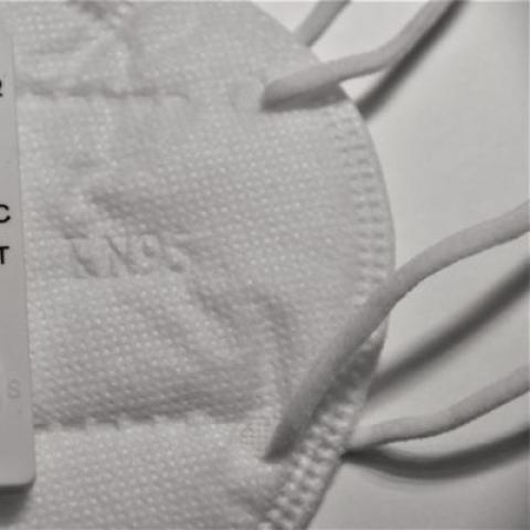 A negative covid test on top of a face mask