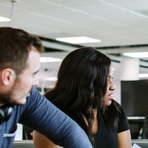Staff members in a meeting