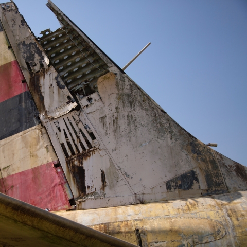 Abandoned airplane with Ugandan's flag - Photo by Sam Balye on Unsplash