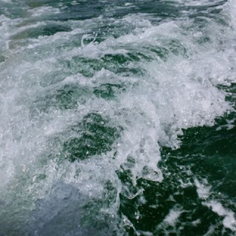 Close up of wave crashing in the sea