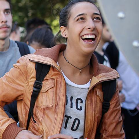 International students standing in a group and smiling
