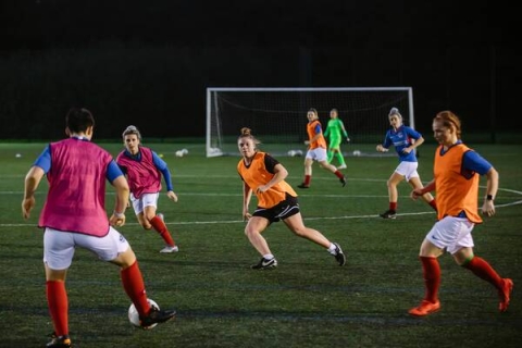 Group of women playing football