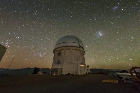 DES telescope exterior against night sky