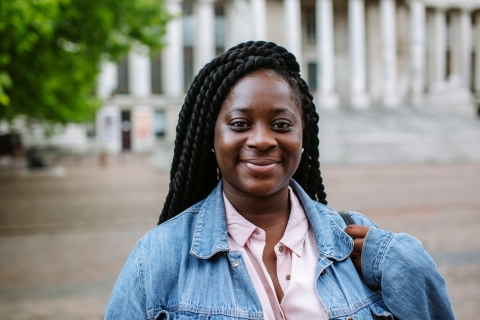 Mimi stood in front of Portsmouth Guildhall