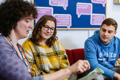Students getting advice from a uni student finance advisor