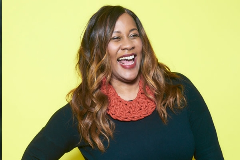Headshot of Karen Blackett laughing