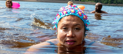 Woman swimming outside