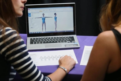Laboratory staff member explaining results