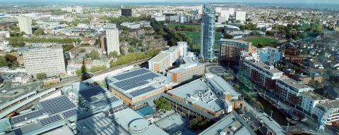 aerial shot of Gunwharf Quays, with Portsmouth in the background