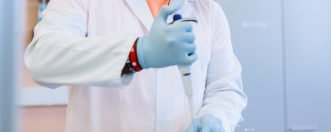 A student working in the Biochemistry and Biology lab