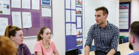 Students and lecturer in a classroom