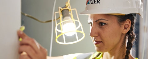 female civil engineering student at building site