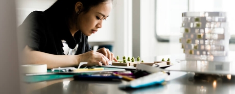 student drawing designs