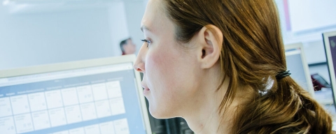 Female business student at screen