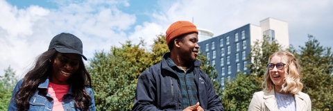 Students walking in park
