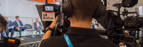 Student film crew producing a show