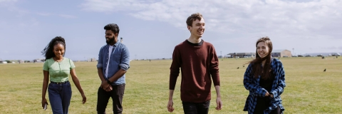 4 students in Southsea walking on the common