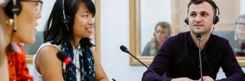 Translators working in translation suite