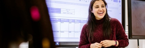 Postgraduate student giving a presentation