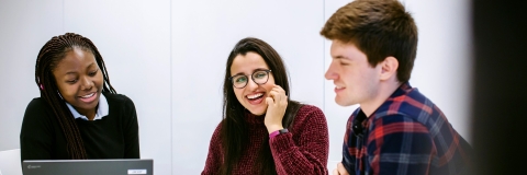 Group of postgraduate students in a meeting room
