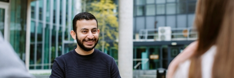 Students sat at table talking