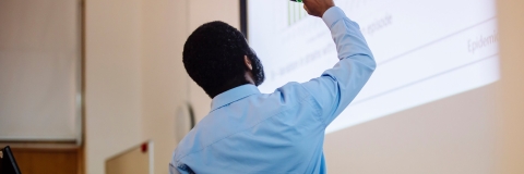 Person looking at projection